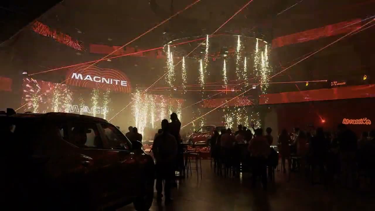 Cold spark fountains firing at an indoor product launch